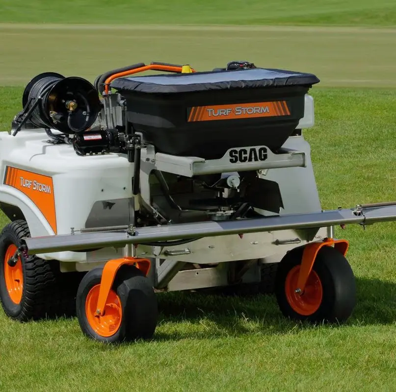 Ride-on spreader on a lawn